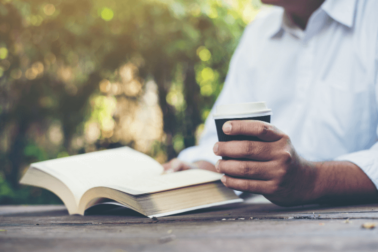 man reading book